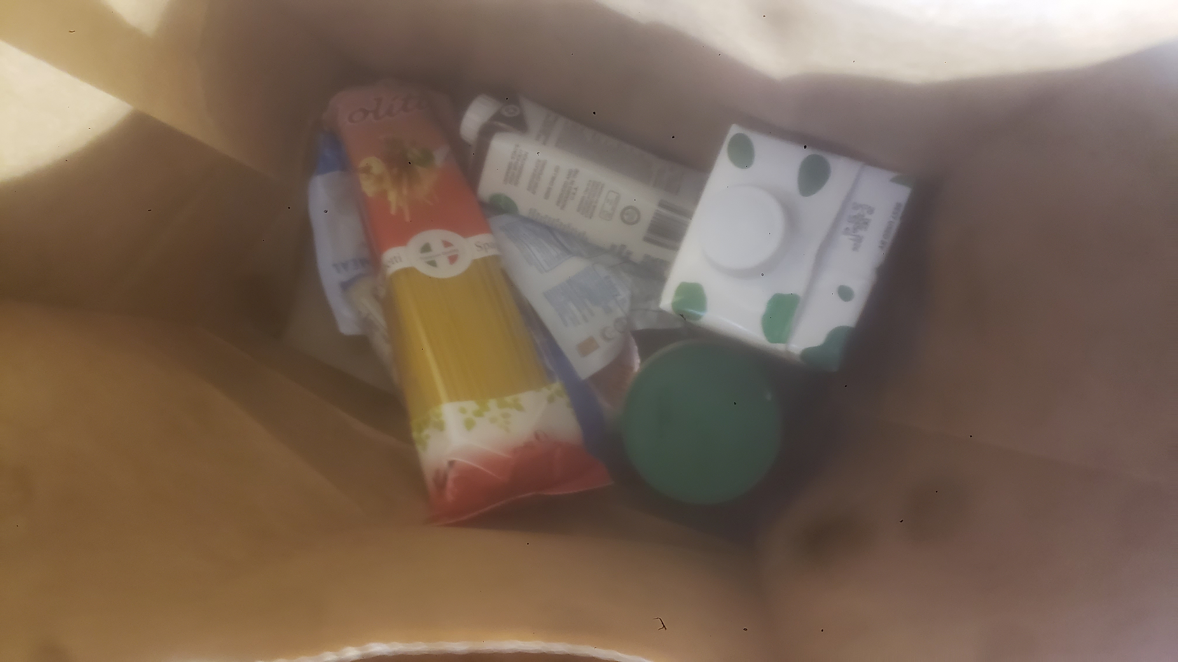 Dry goods in a paper bag.
